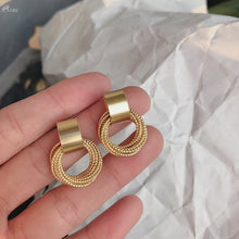 Load image into Gallery viewer, AOMU 2019 Simple New Gold Metal Multi-layer Circle Winding Geometric Round Small Stud Earrings for Women Girl Party Jewelry
